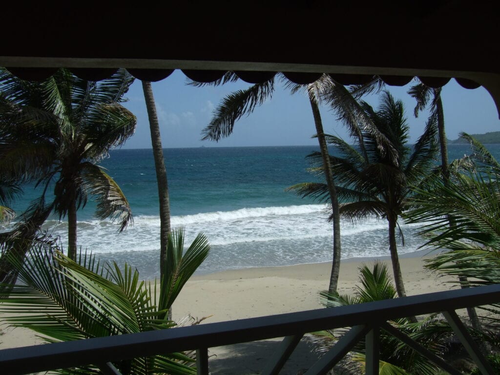 view from the verandah of Petite Anse Hotel's beachfront cottage in Grenada.