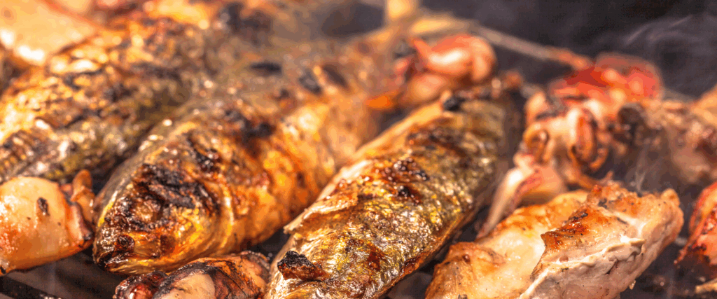 Fish on BBQ on Grenada Street Food Tour Adventure with Petite Anse Hotel.