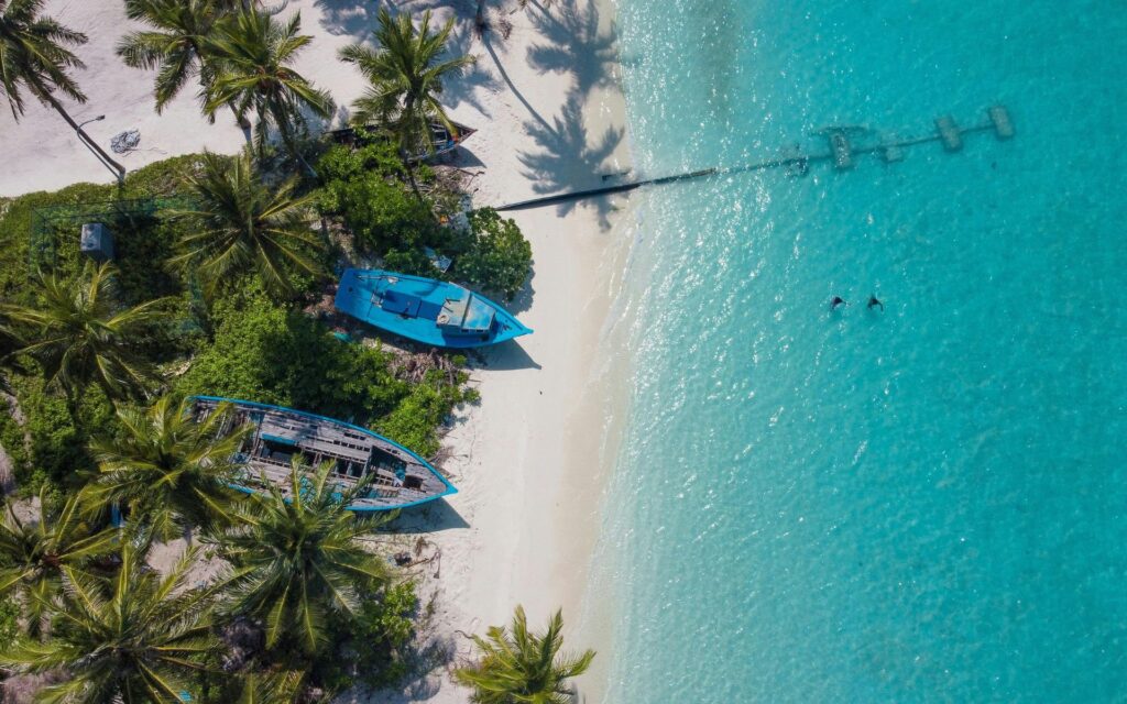 grenada beach aerial view boats turquoise water coastline