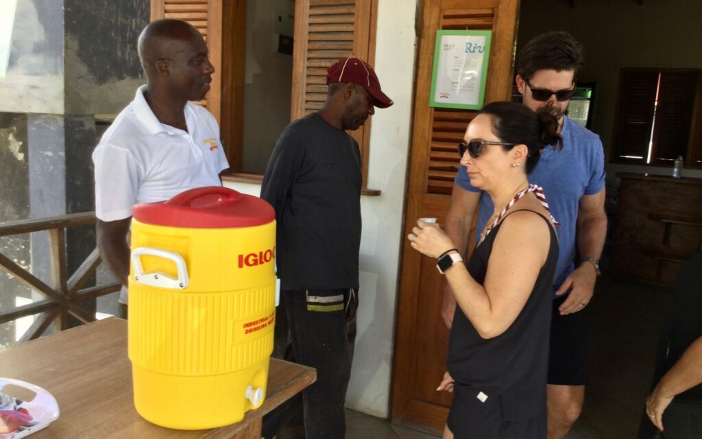 Visitors tasting Rivers Royal Grenadian Rum at River Antoine Rum Distillery