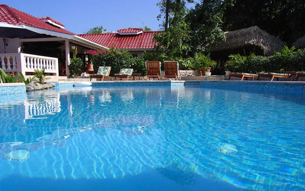 Swimming pool with sea views at Petite Anse Hotel Grenada