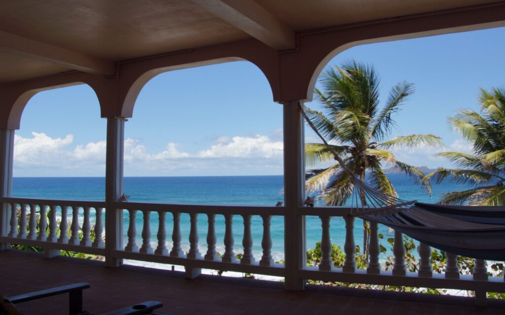 View of the Grenadines from the Grenadine Rooms at Petite Anse Hotel